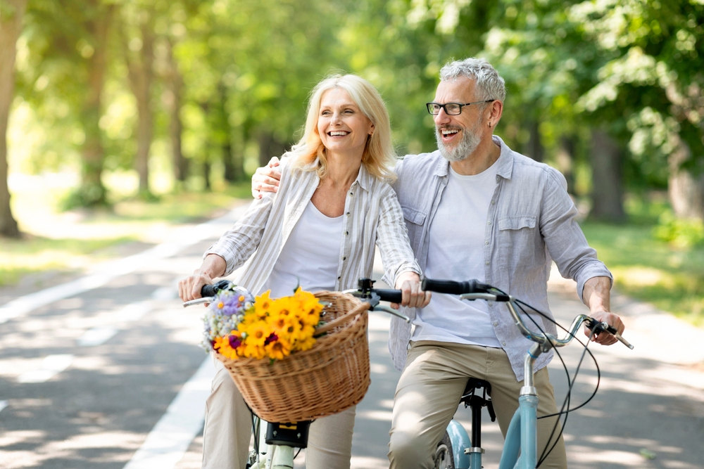 couple smiling outdoors after dental care in Port Richey FL